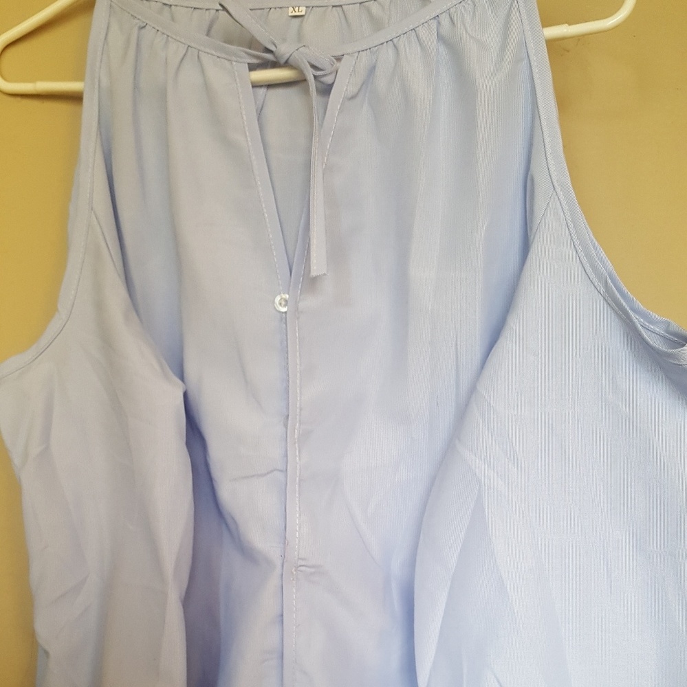 Cold shoulder button down top.